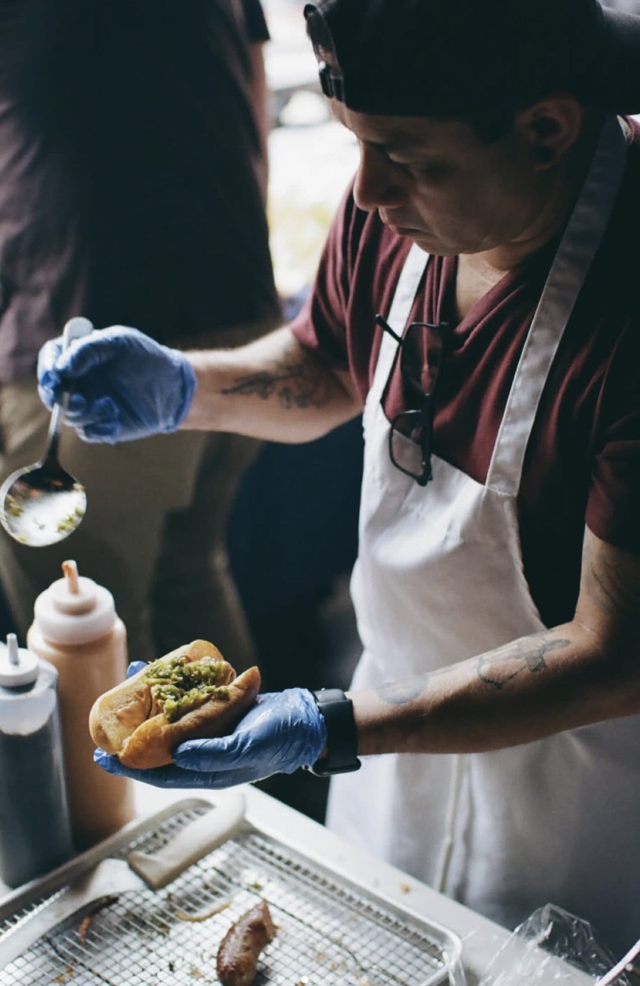 Eduardo assembling food at a prep station